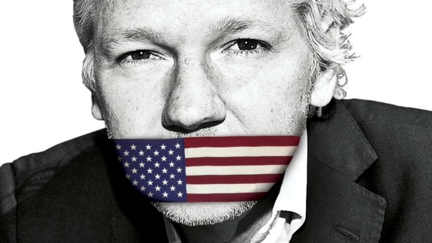 https://gewerkschaftsforum.de/wp-content/uploads/2022/06/assange-us-flag-860x484-1.jpg